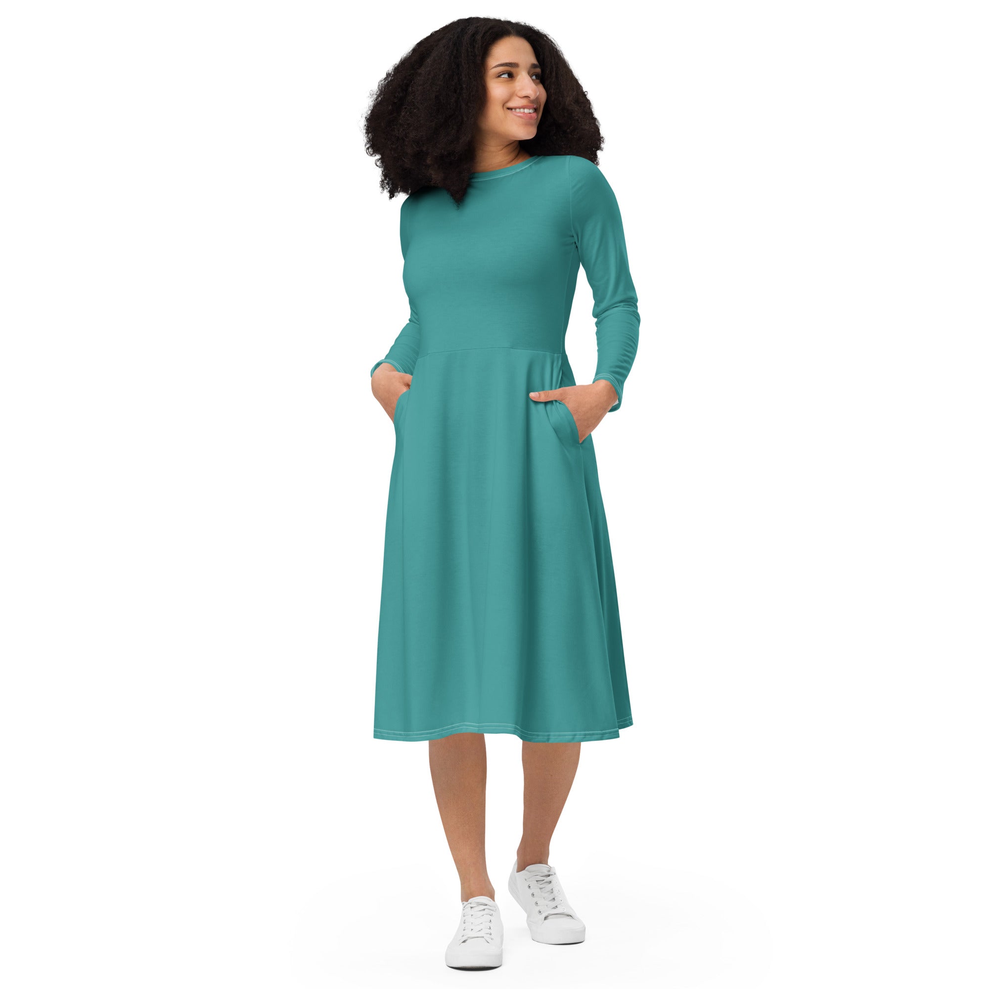 Womens Long Sleeve Midi Dress in Teal Green featuring a boat neckline, long sleeves, and side pockets, showcasing a flattering fitted waist and flared bottom.