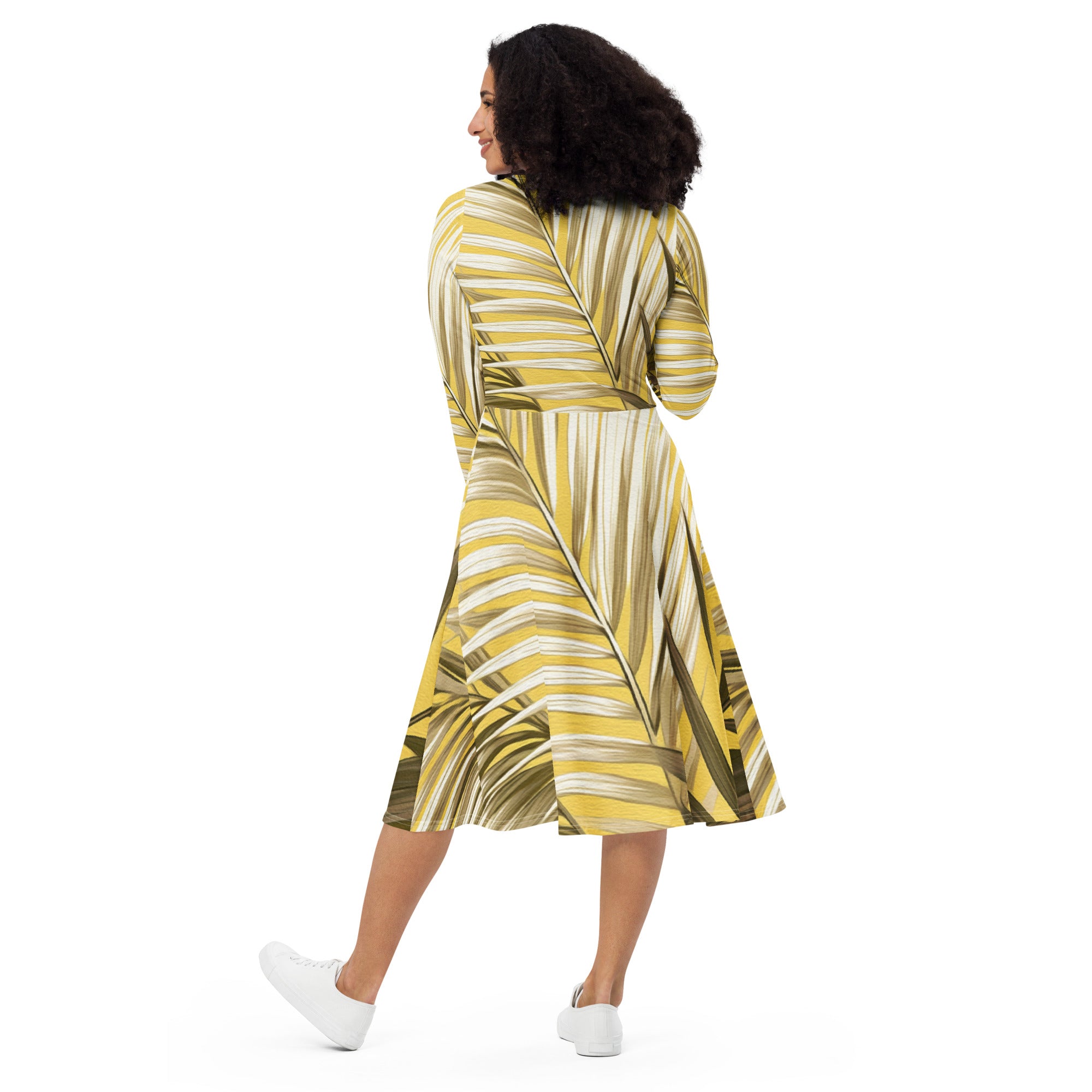 Womens Long Sleeve Midi Dress featuring a white and brown palm leaves design, showcasing its fitted waist, flared bottom, and long sleeves.