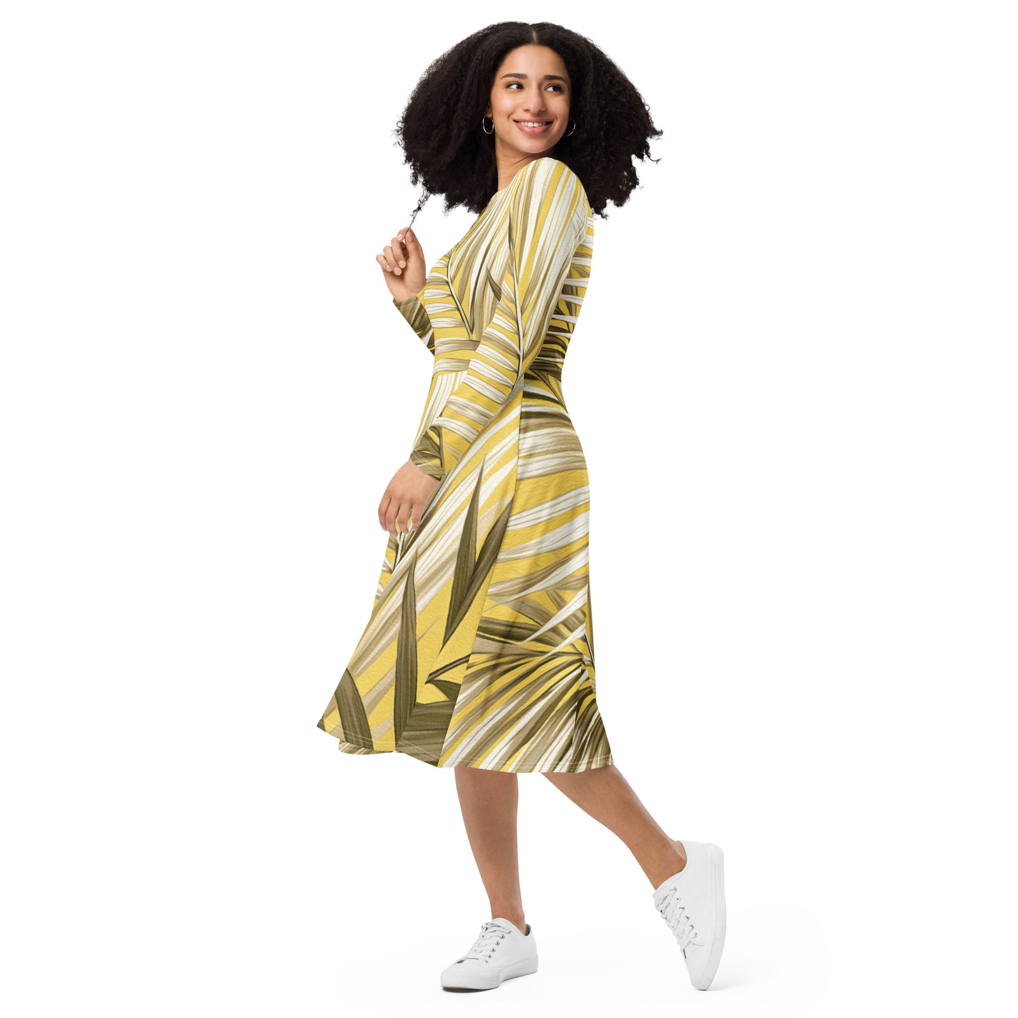 Womens Long Sleeve Midi Dress featuring a white and brown palm leaves design, showcasing its fitted waist, flared bottom, and long sleeves.