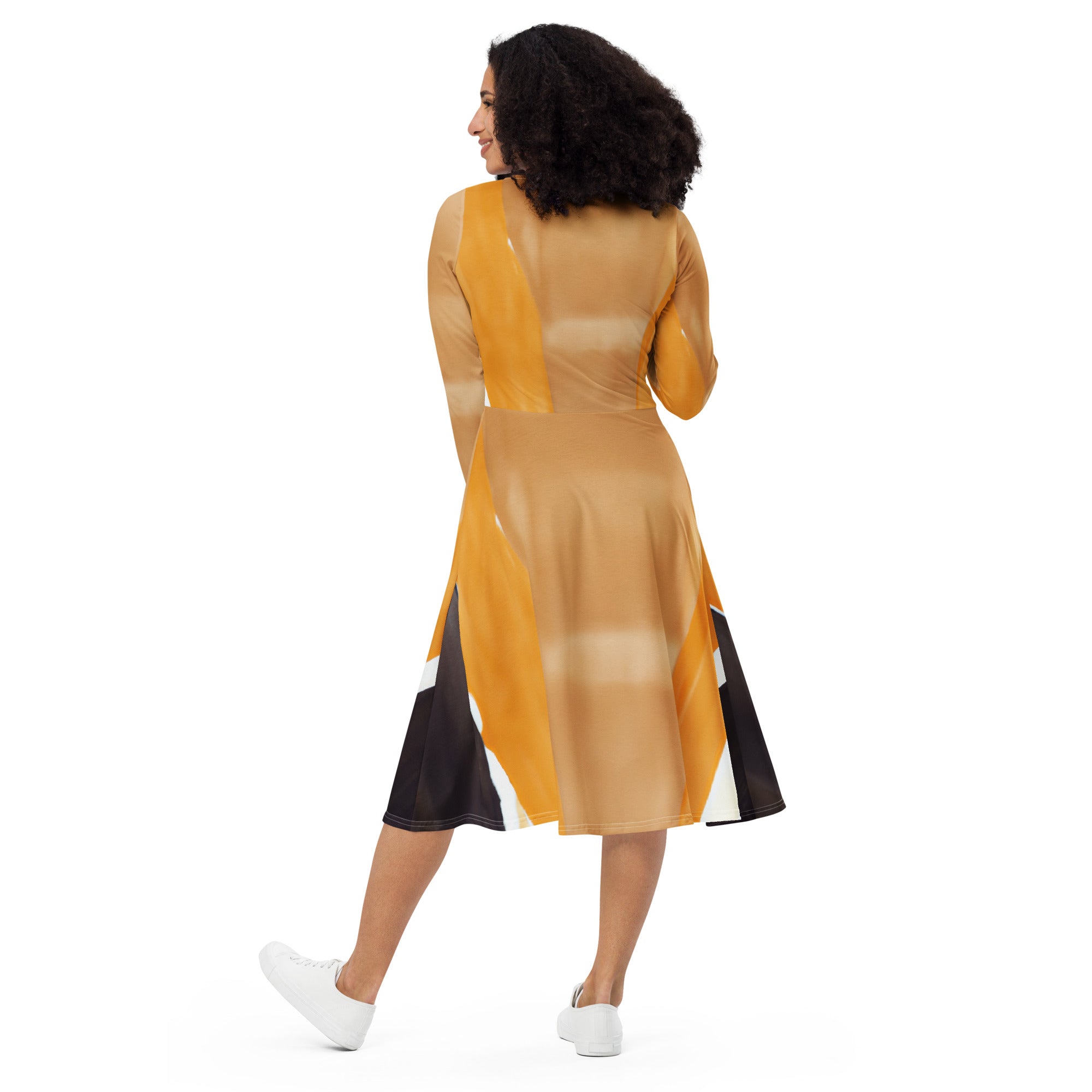 Womens Long Sleeve Midi Dress featuring a yellow brown abstract pattern, showcasing its elegant boat neckline and flared bottom with side pockets.