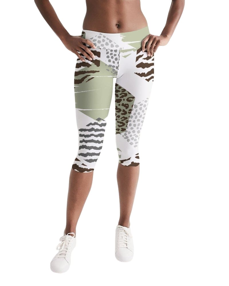 Women's mid-rise capri leggings featuring a beige geometric print, designed for comfort and style during workouts or lounging.