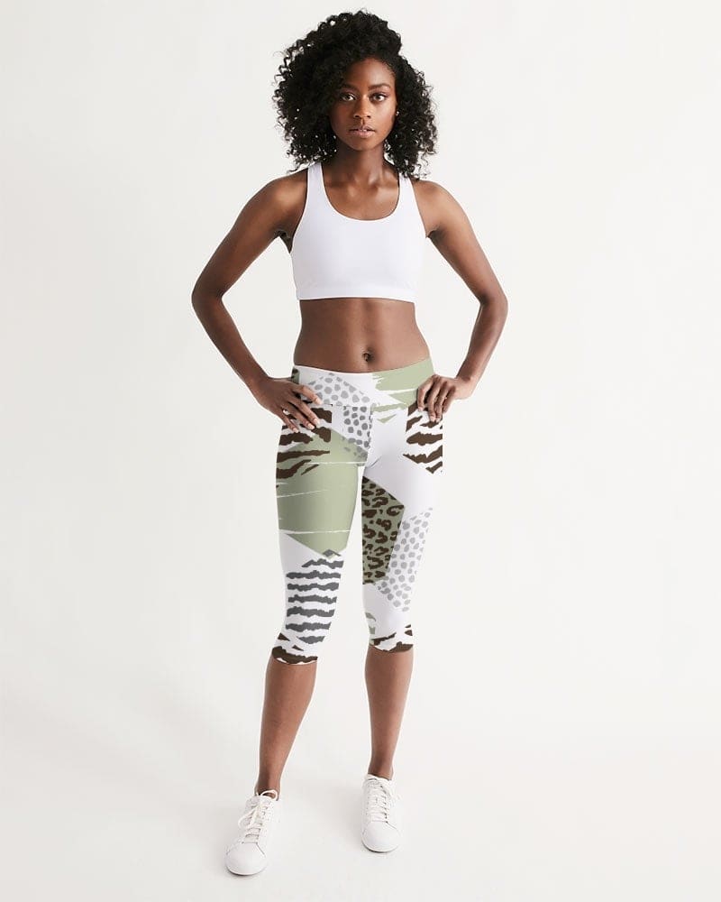 Women's mid-rise capri leggings featuring a beige geometric print, designed for comfort and style during workouts or lounging.