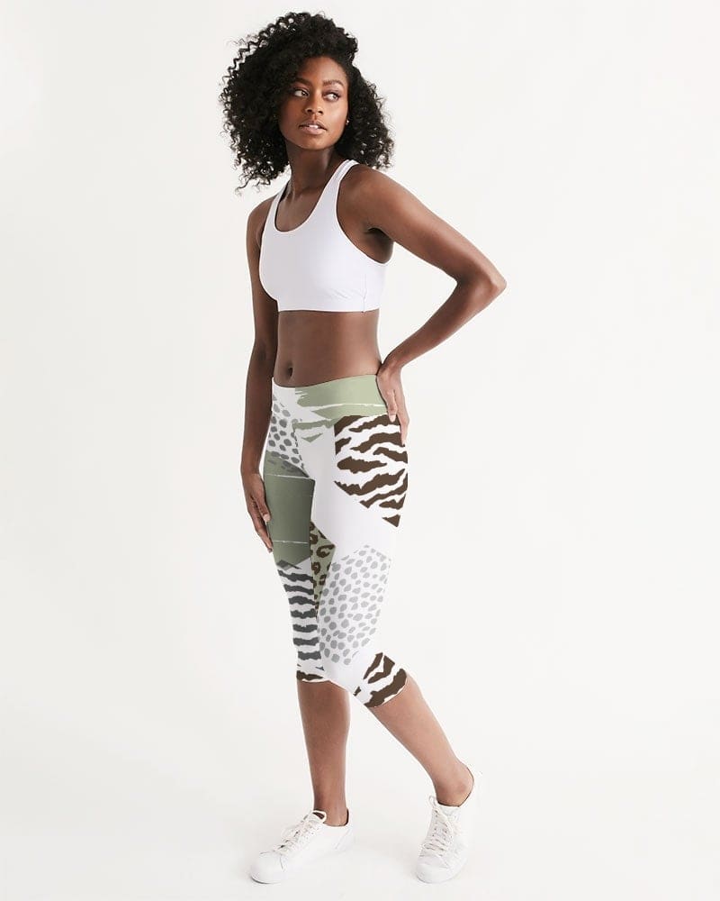 Women's mid-rise capri leggings featuring a beige geometric print, designed for comfort and style during workouts or lounging.