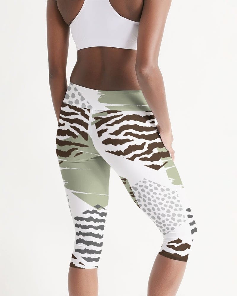 Women's mid-rise capri leggings featuring a beige geometric print, designed for comfort and style during workouts or lounging.