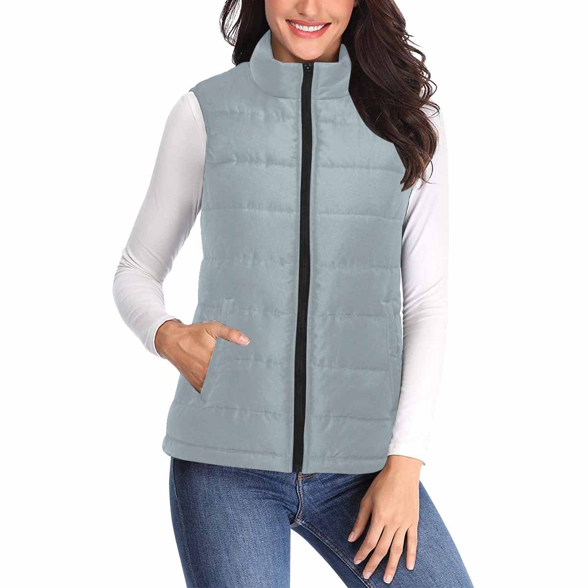 Women's Puffer Vest Jacket in Misty Blue Gray, featuring a quilted design and zipper closure, perfect for layering in cold weather.