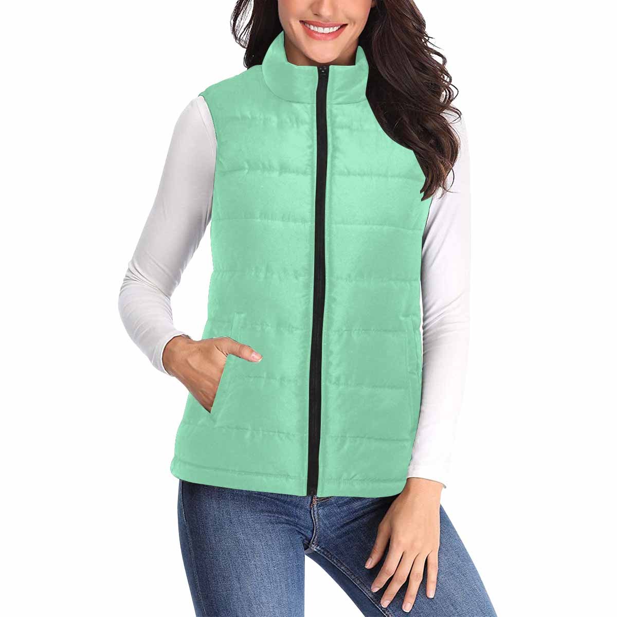 Women's Seafoam Green Puffer Vest Jacket with zipper closure and large pockets, perfect for layering in cooler weather.