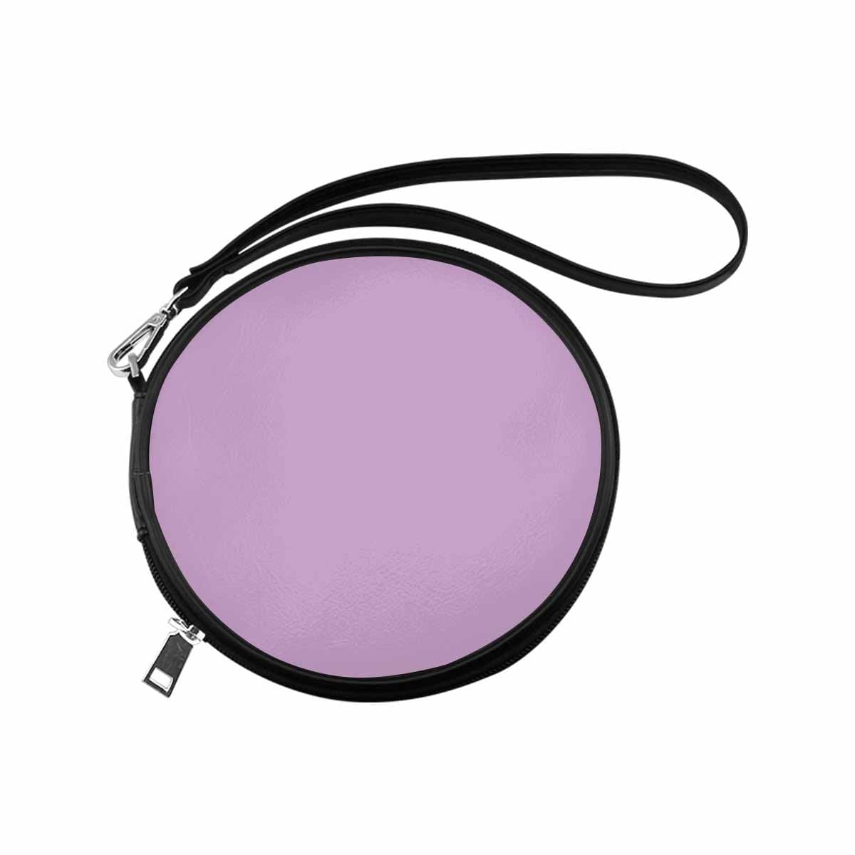 Womens Round Handbag in Lilac Purple, made of high-grade PU leather with a wristlet strap, showcasing a stylish and personalized design.