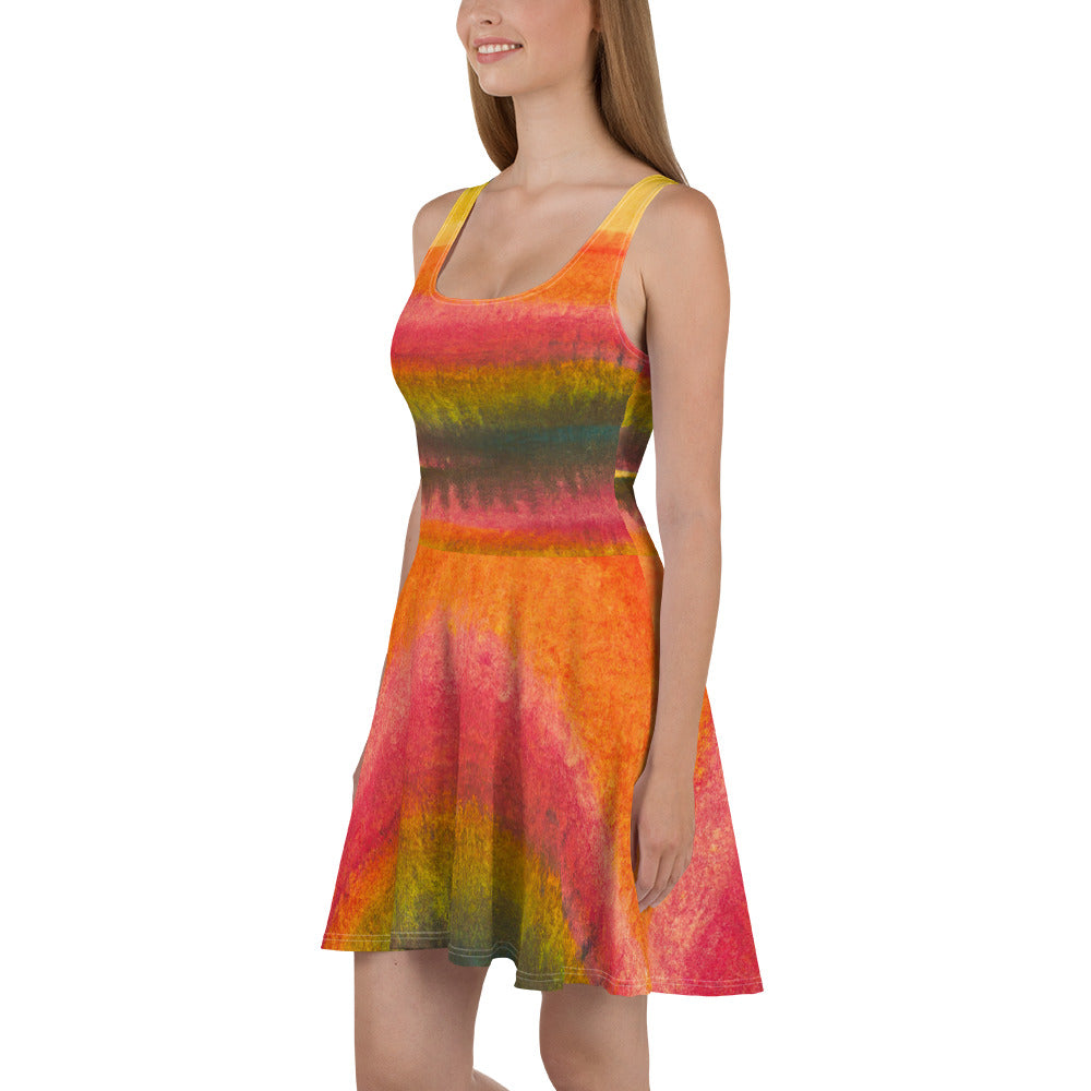 A stylish women's skater dress featuring an Autumn Fall Watercolor Abstract Print, showcasing a flattering A-line silhouette and vibrant colors.