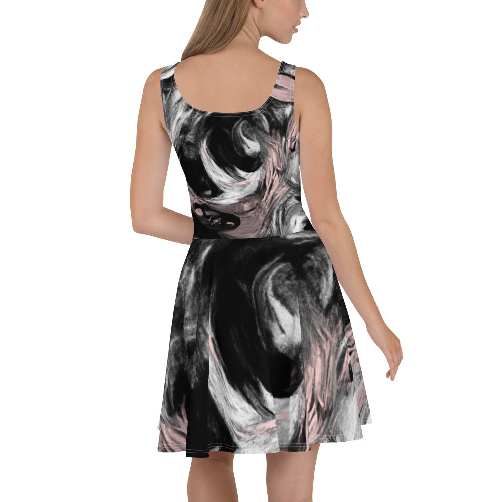 Women's skater dress featuring a black, pink, and white abstract pattern, showcasing a flattering A-line silhouette and sleeveless design.