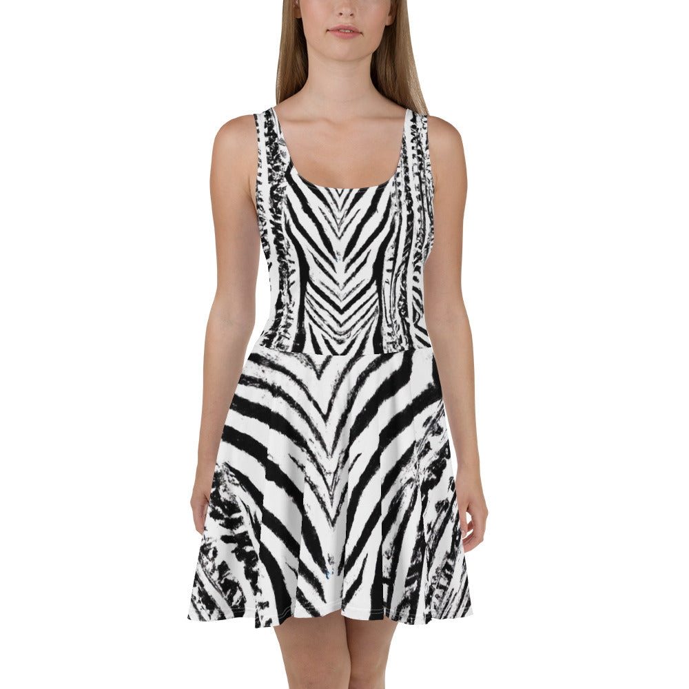 A stylish women's skater dress featuring a black and white native print, showcasing a flattering A-line silhouette and sleeveless design.