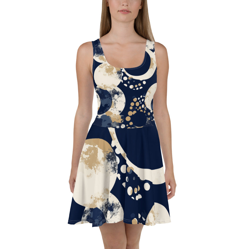 Women's skater dress featuring a blue and beige spotted print, with a flattering A-line silhouette and sleeveless design.