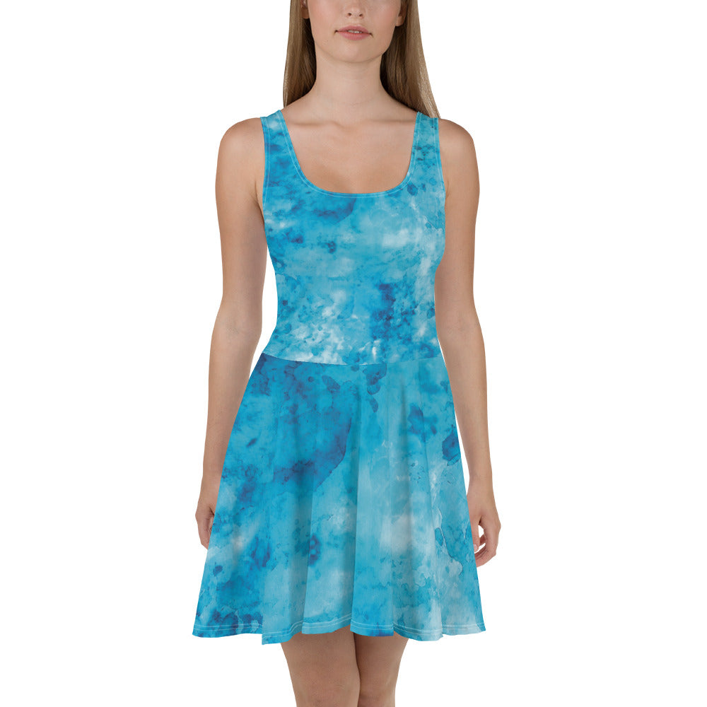 Women's skater dress featuring a blue marble print, showcasing a flattering A-line silhouette and sleeveless design.