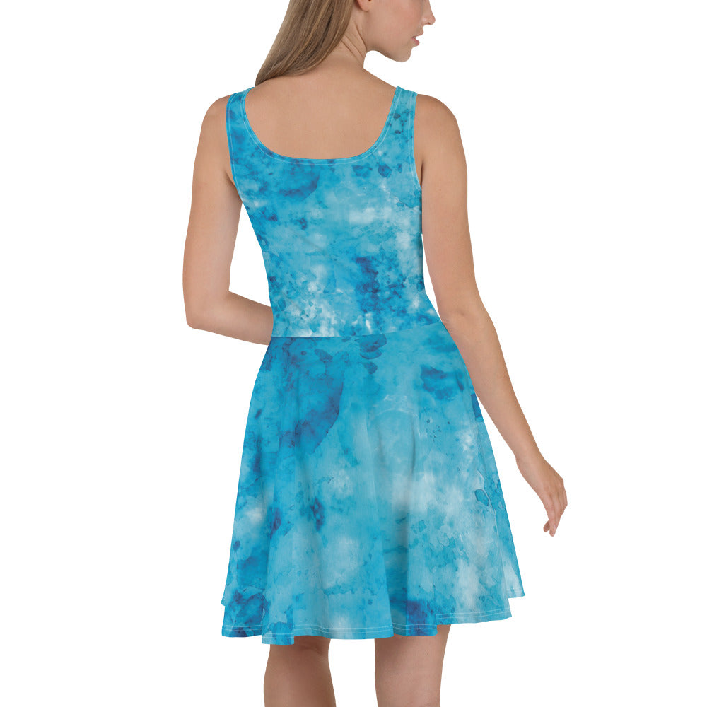 Women's skater dress featuring a blue marble print, showcasing a flattering A-line silhouette and sleeveless design.