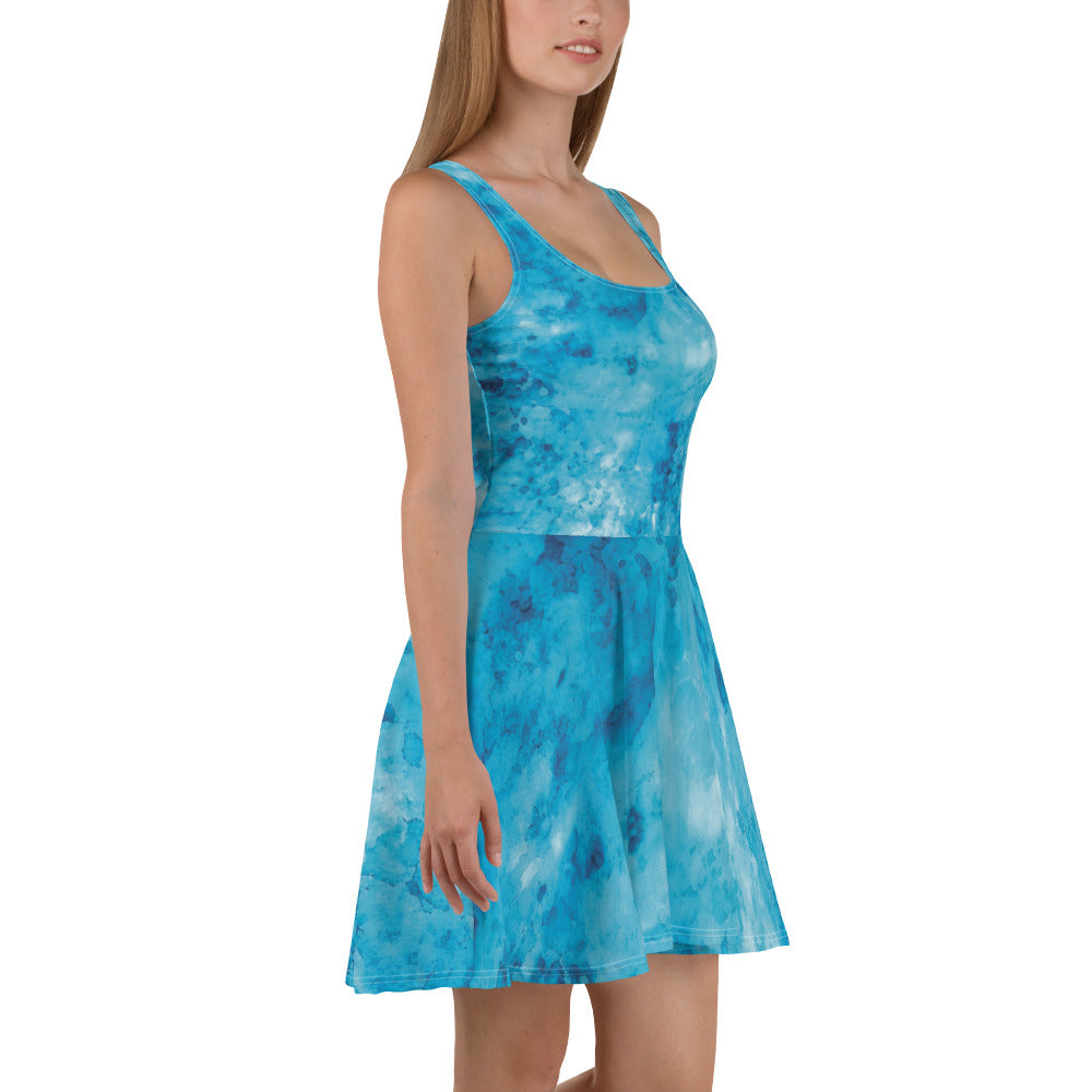 Women's skater dress featuring a blue marble print, showcasing a flattering A-line silhouette and sleeveless design.