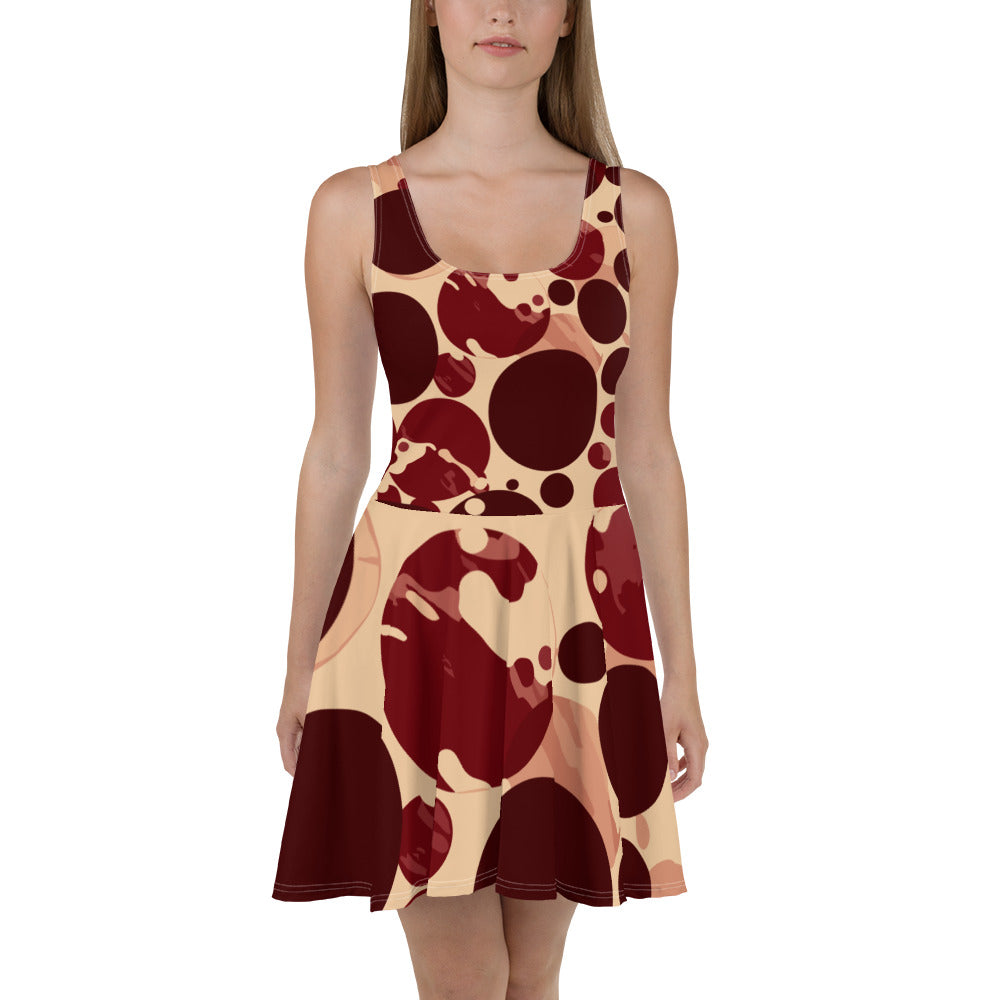 Women's skater dress in burgundy and beige with a circular print, featuring a flattering A-line silhouette and knee-length hem.