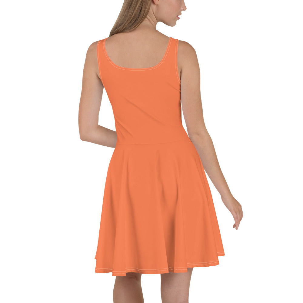 A vibrant coral orange red women's skater dress featuring an A-line silhouette, sleeveless design, and knee-length hem.