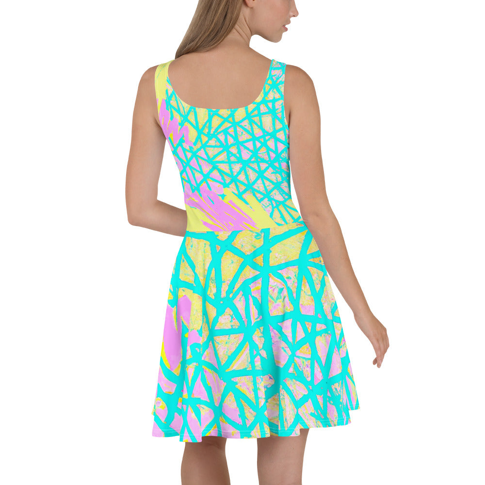 A vibrant Women's Skater Dress featuring a Cyan Blue, Lime Green, and Pink Pattern, showcasing its A-line silhouette and sleeveless design.