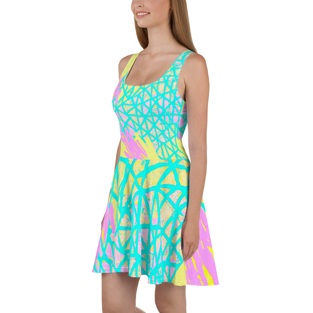 A vibrant Women's Skater Dress featuring a Cyan Blue, Lime Green, and Pink Pattern, showcasing its A-line silhouette and sleeveless design.