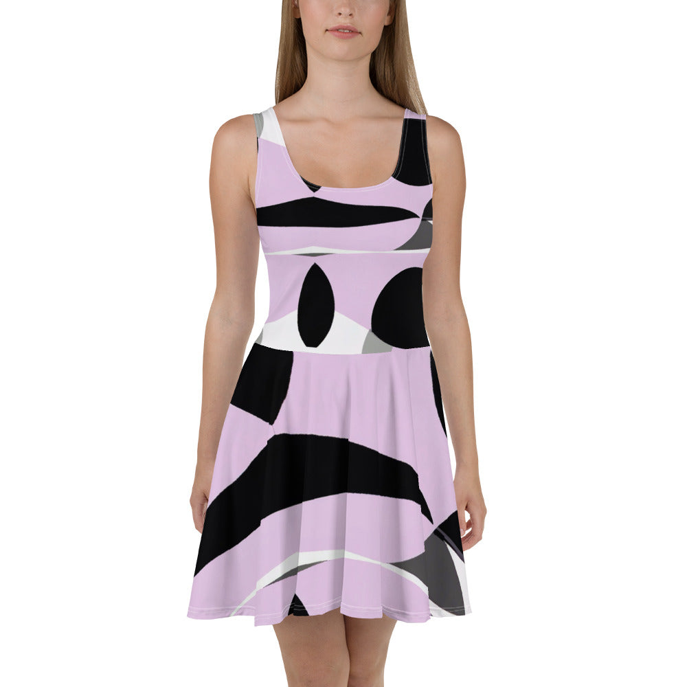 Women's skater dress featuring a geometric lavender and black pattern, showcasing a flattering A-line silhouette and sleeveless design.