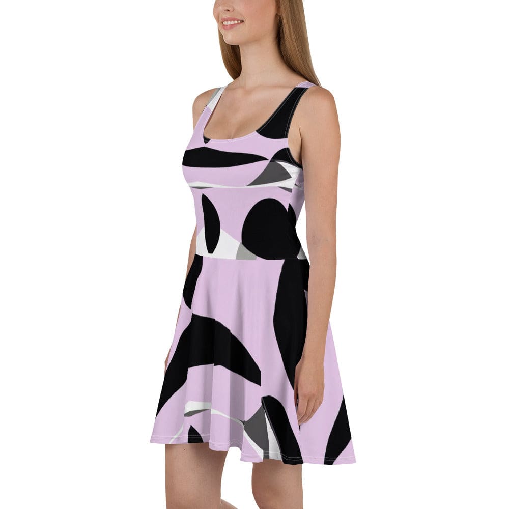 Women's skater dress featuring a geometric lavender and black pattern, showcasing a flattering A-line silhouette and sleeveless design.