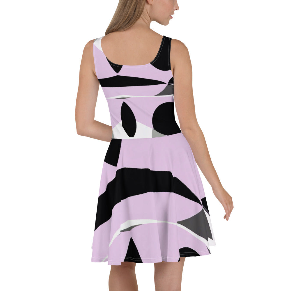 Women's skater dress featuring a geometric lavender and black pattern, showcasing a flattering A-line silhouette and sleeveless design.