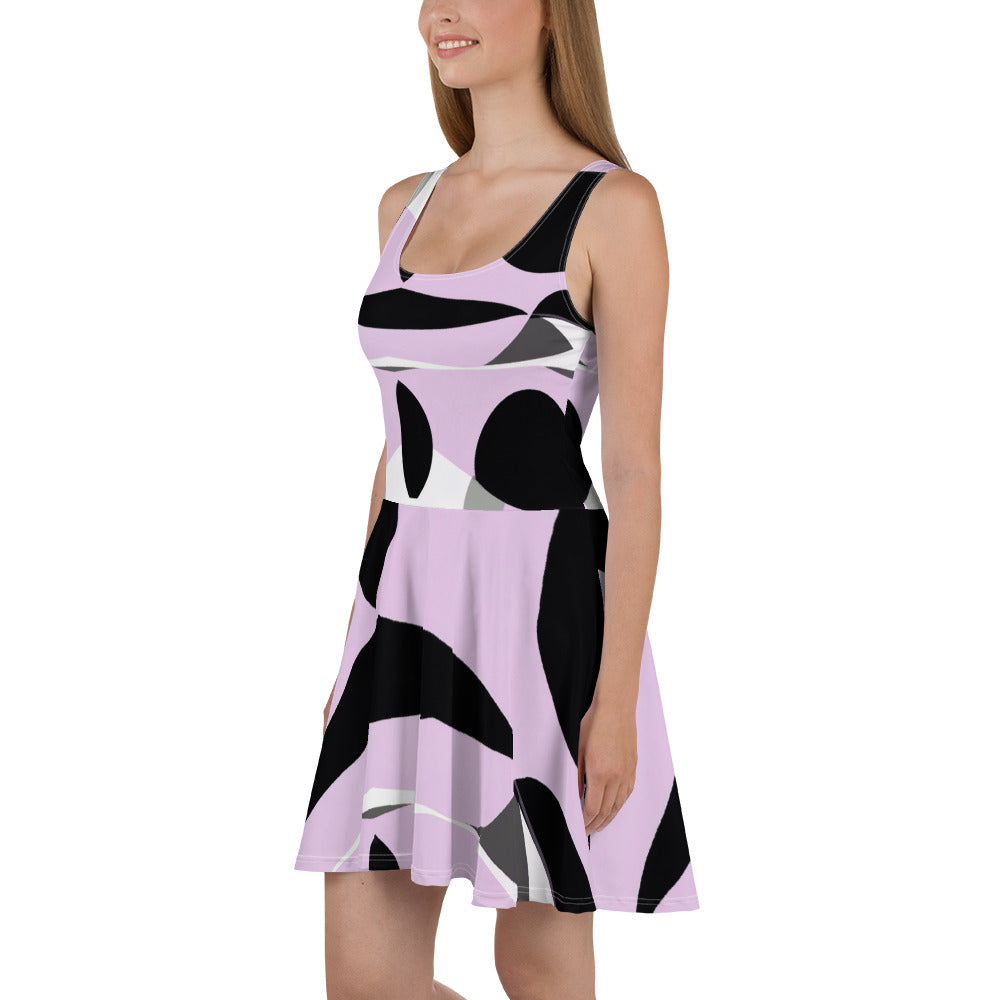 Women's skater dress featuring a geometric lavender and black pattern, showcasing a flattering A-line silhouette and sleeveless design.