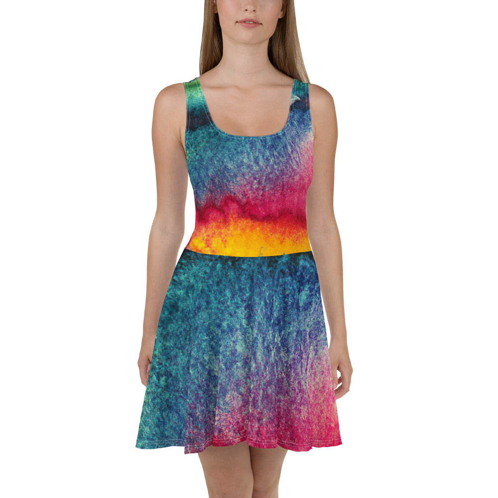 A vibrant Women's Skater Dress featuring a multicolor abstract pattern, showcasing a flattering A-line silhouette and sleeveless design.