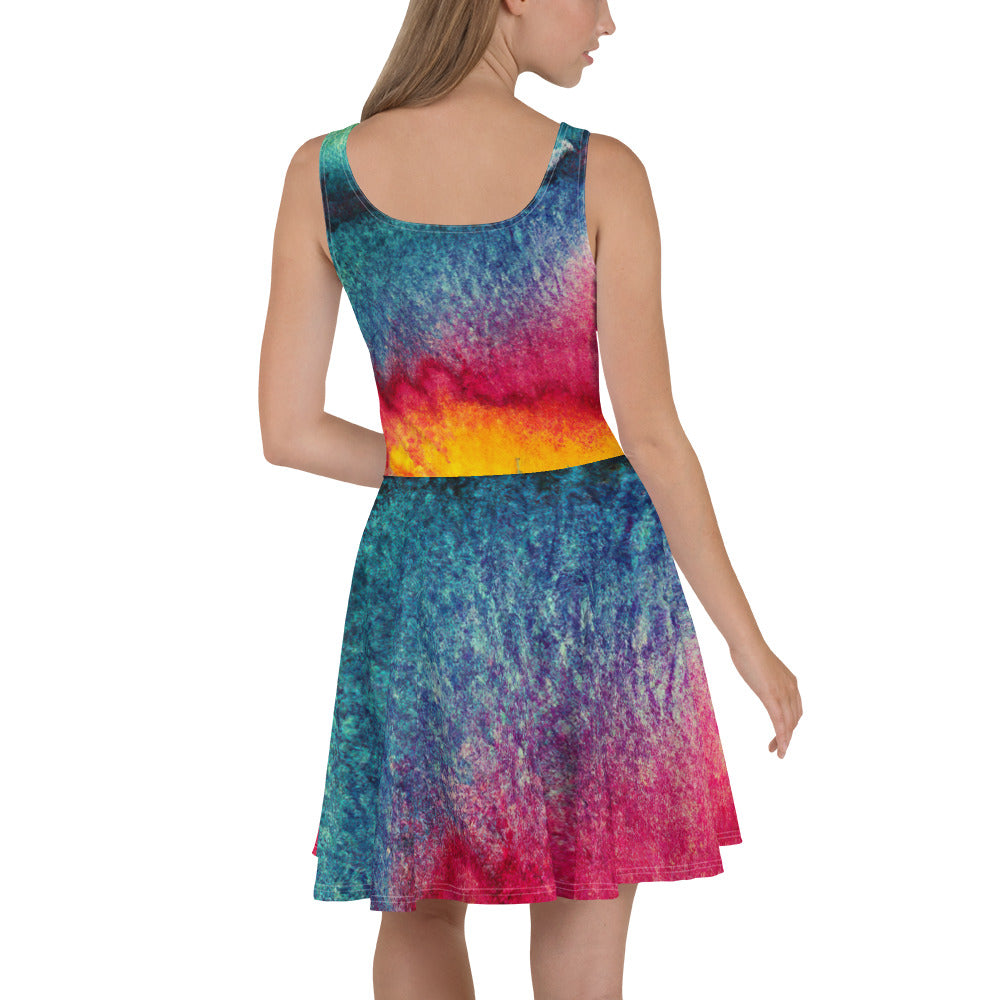 A vibrant Women's Skater Dress featuring a multicolor abstract pattern, showcasing a flattering A-line silhouette and sleeveless design.