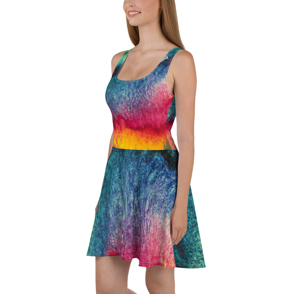 A vibrant Women's Skater Dress featuring a multicolor abstract pattern, showcasing a flattering A-line silhouette and sleeveless design.