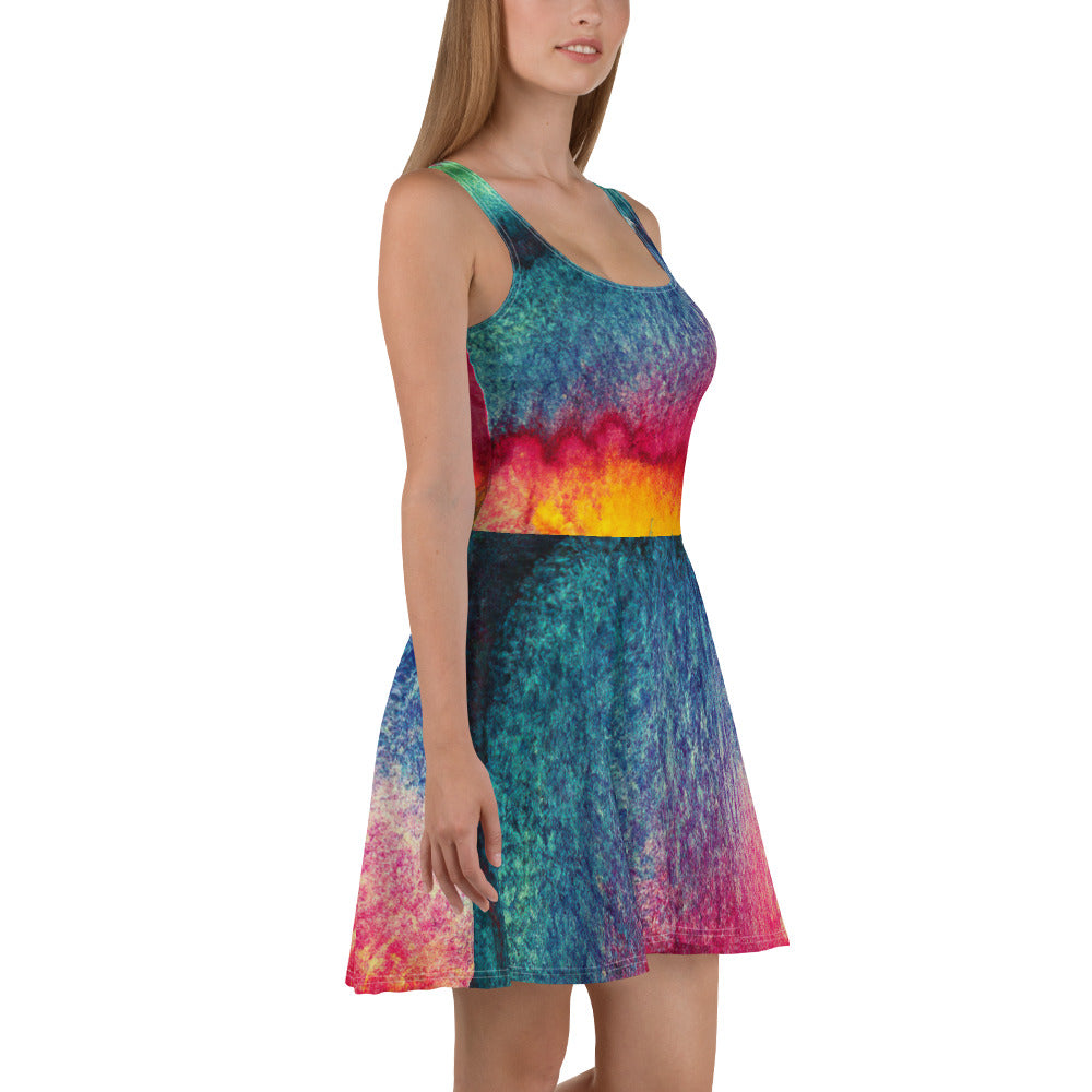 A vibrant Women's Skater Dress featuring a multicolor abstract pattern, showcasing a flattering A-line silhouette and sleeveless design.