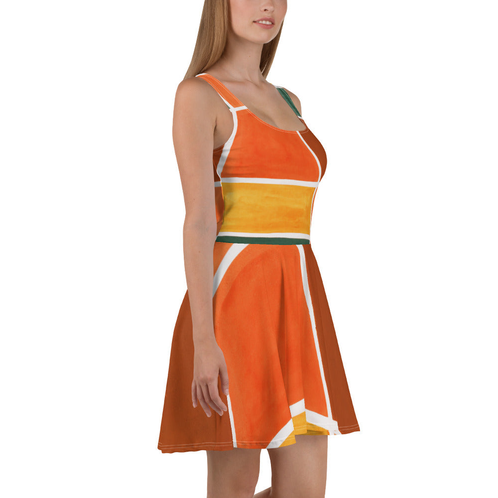 A vibrant women's skater dress featuring an orange and green boho pattern, showcasing a flattering A-line silhouette and sleeveless design.