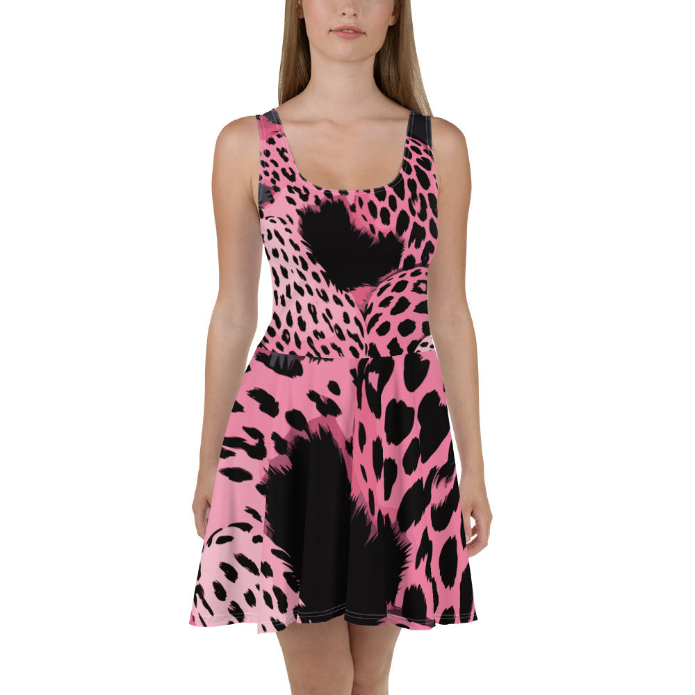 A stylish women's skater dress featuring a pink and black spotted print, showcasing a flattering A-line silhouette and sleeveless design.