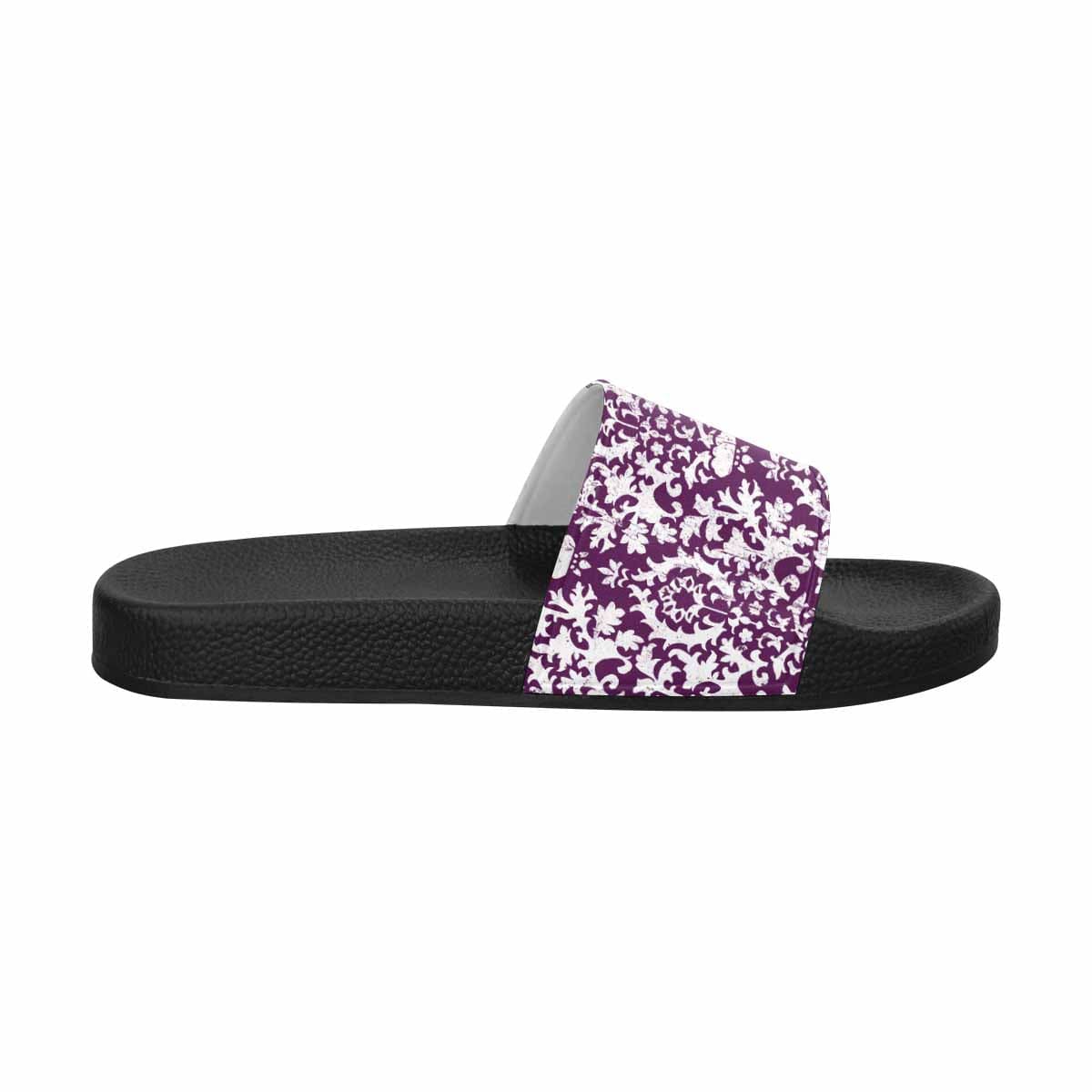 A pair of stylish women's slide sandals featuring soft PVC straps and a durable sole, perfect for casual wear.