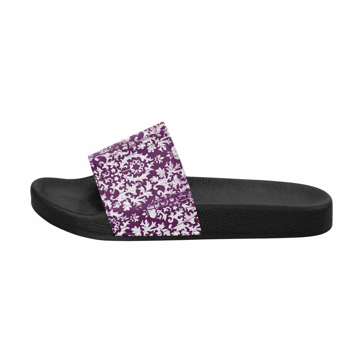 A pair of stylish women's slide sandals featuring soft PVC straps and a durable sole, perfect for casual wear.