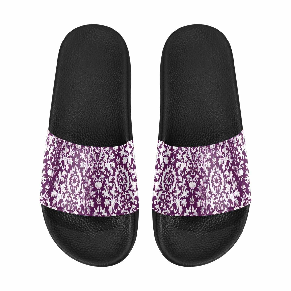 A pair of stylish women's slide sandals featuring soft PVC straps and a durable sole, perfect for casual wear.