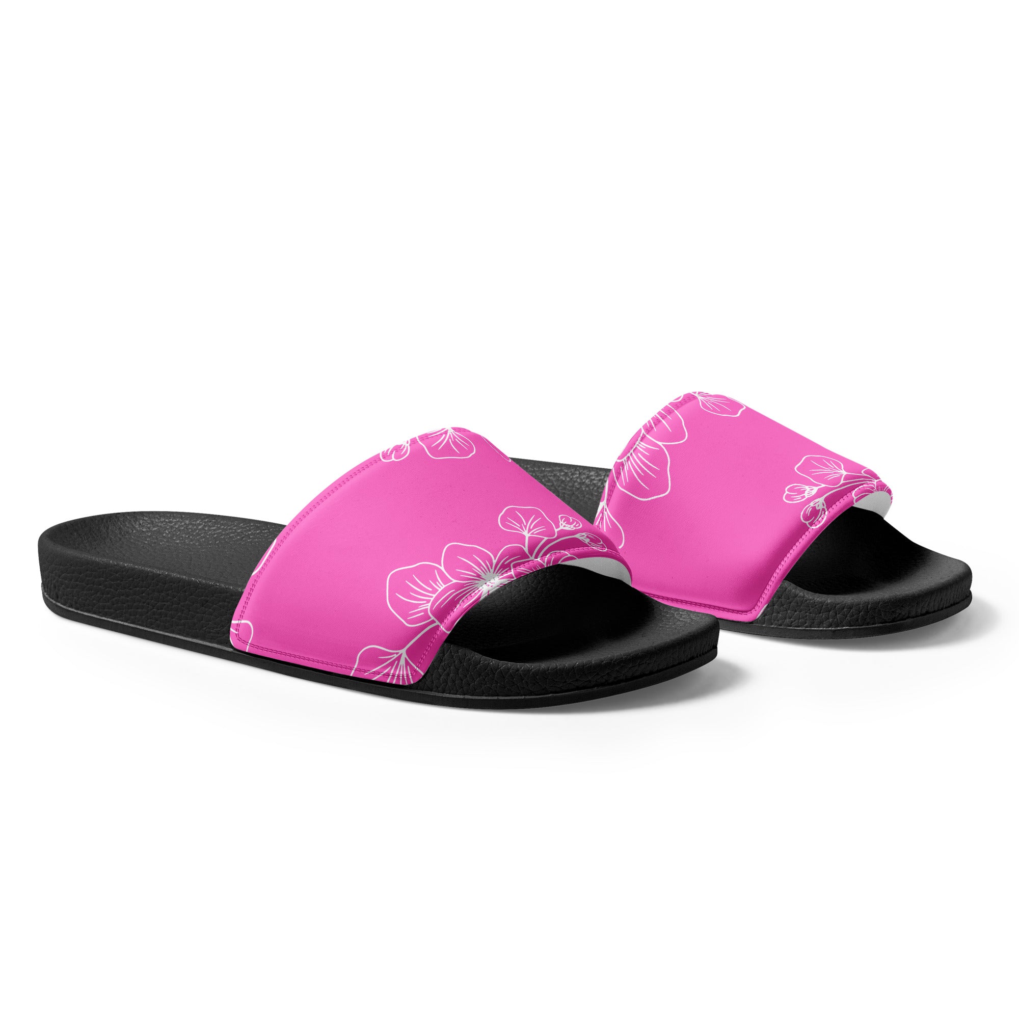 A pair of stylish women's slide sandals featuring a cushioned faux leather strap and textured footbed, perfect for summer activities.