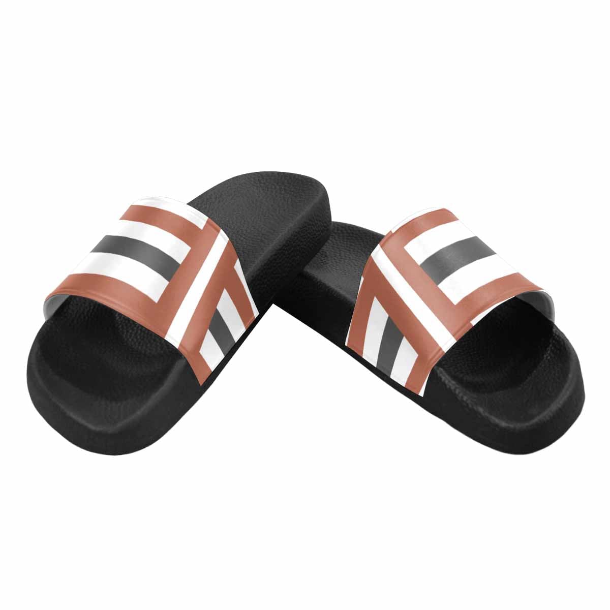 A pair of stylish Womens Slide Sandals featuring lightweight PVC straps and a comfortable sole, perfect for casual wear.