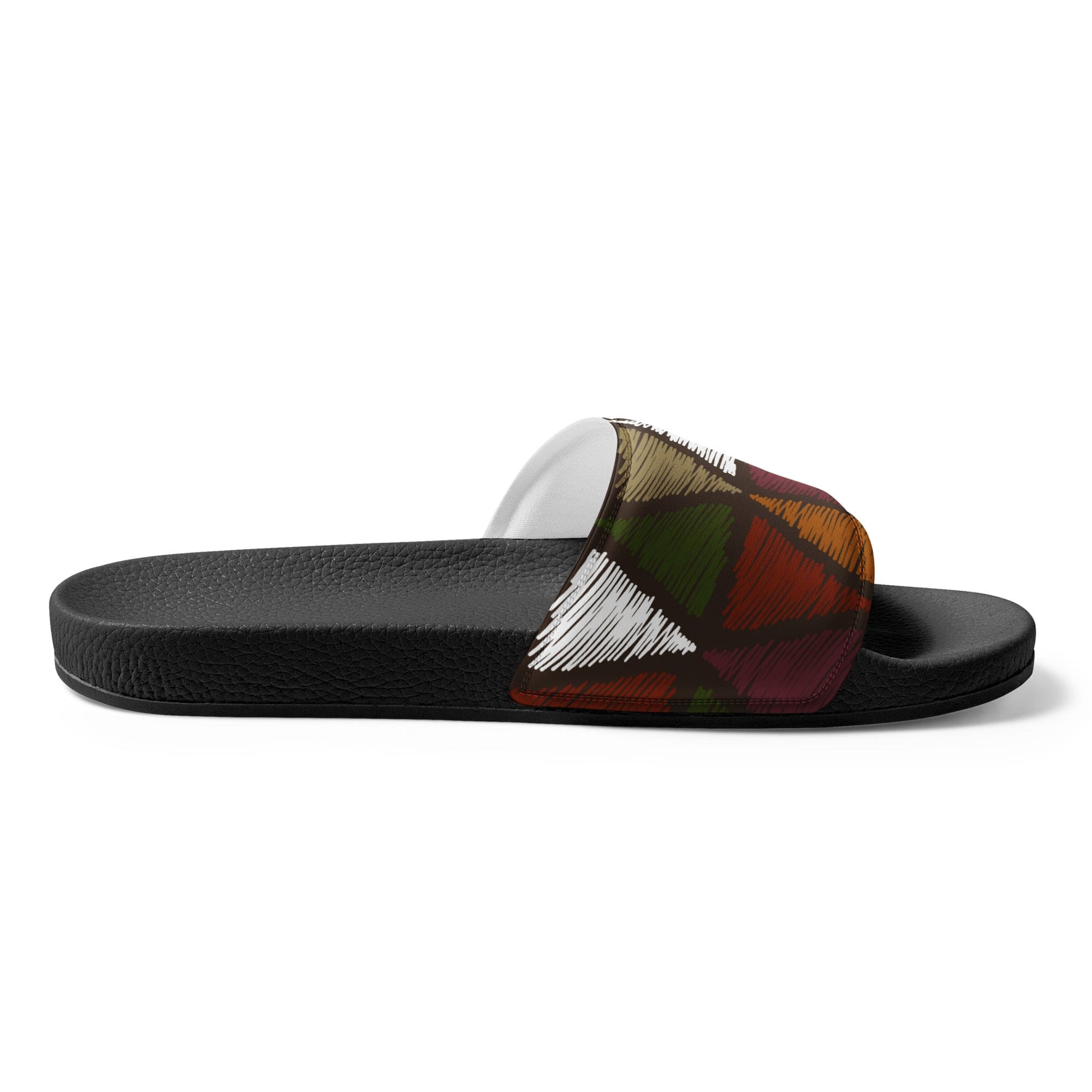 A pair of women's slides featuring a forest green and white tribal quilting fabric print, showcasing a cushioned upper strap and textured footbed.