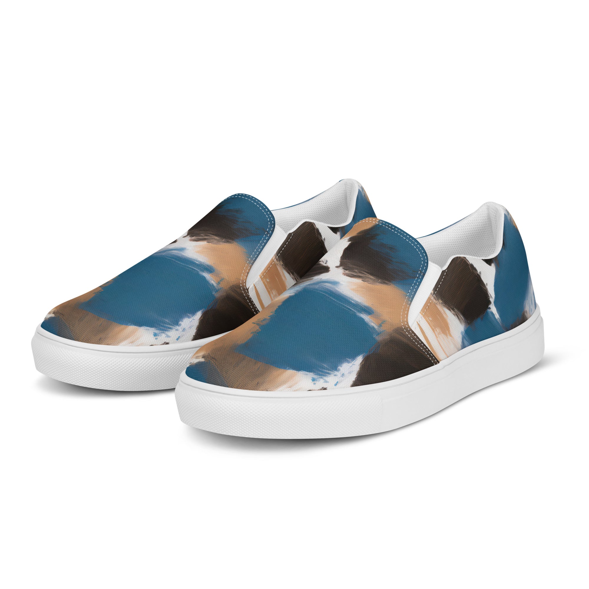 Womens slip-on canvas shoes featuring a spotted rustic brown, black, and blue abstract design, perfect for casual wear.