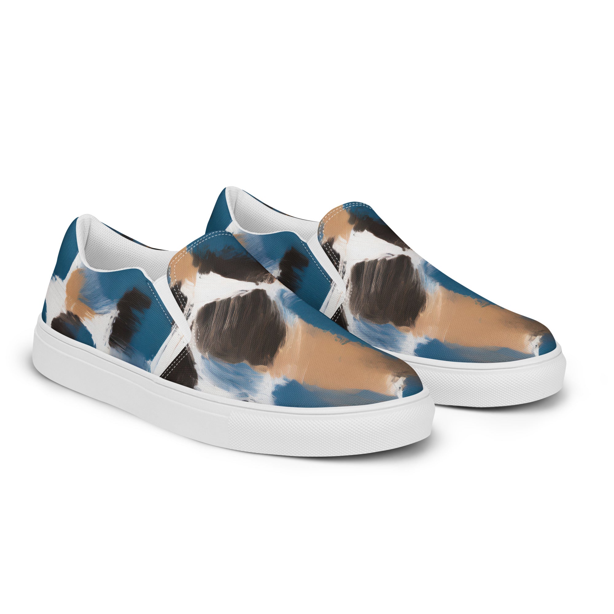 Womens slip-on canvas shoes featuring a spotted rustic brown, black, and blue abstract design, perfect for casual wear.