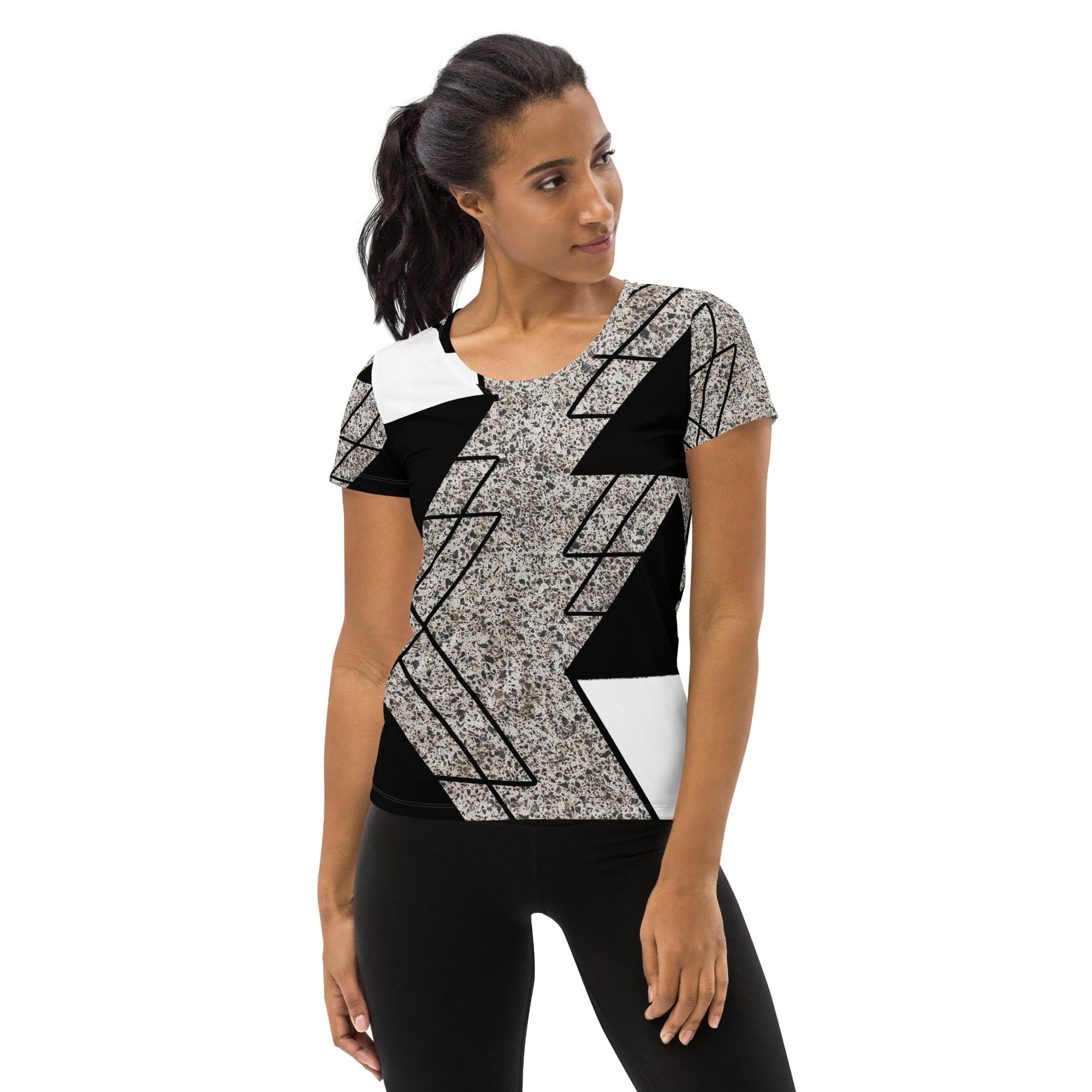 Women's Stretch Fit Athletic Sports T-shirt in black and white with a triangular colorblock design, showcasing its soft fabric and athletic silhouette.