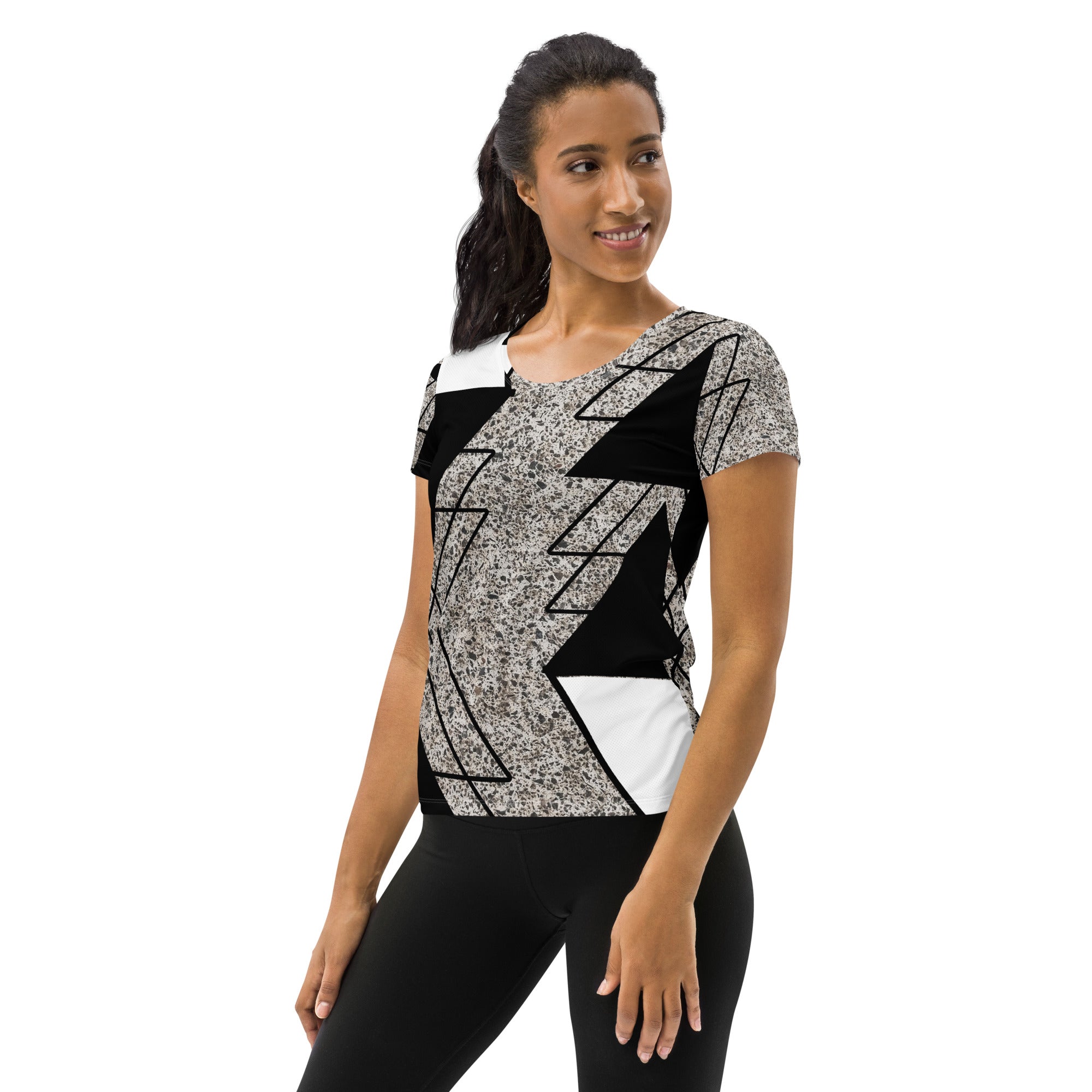 Women's Stretch Fit Athletic Sports T-shirt in black and white with a triangular colorblock design, showcasing its soft fabric and athletic silhouette.