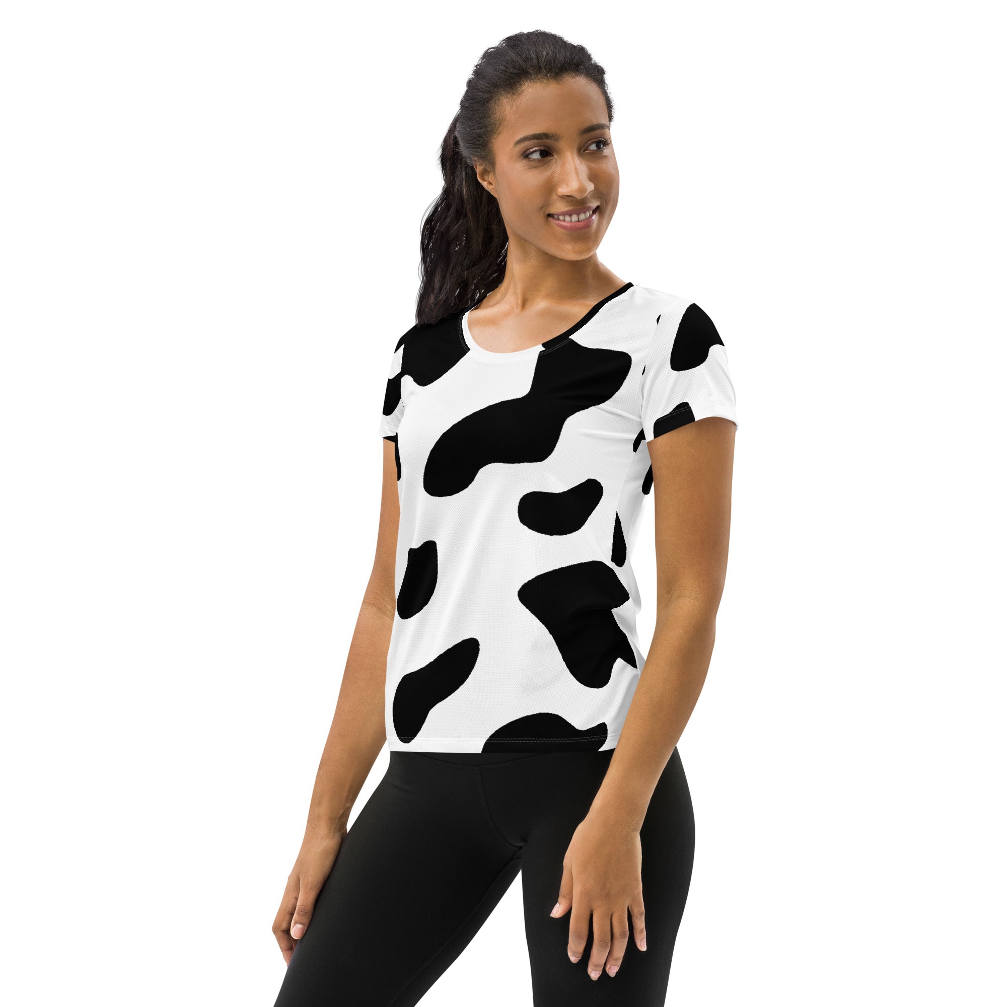 Women's Stretch Fit Athletic Sports T-shirt featuring a stylish black and white cow print, designed for comfort and performance during workouts.