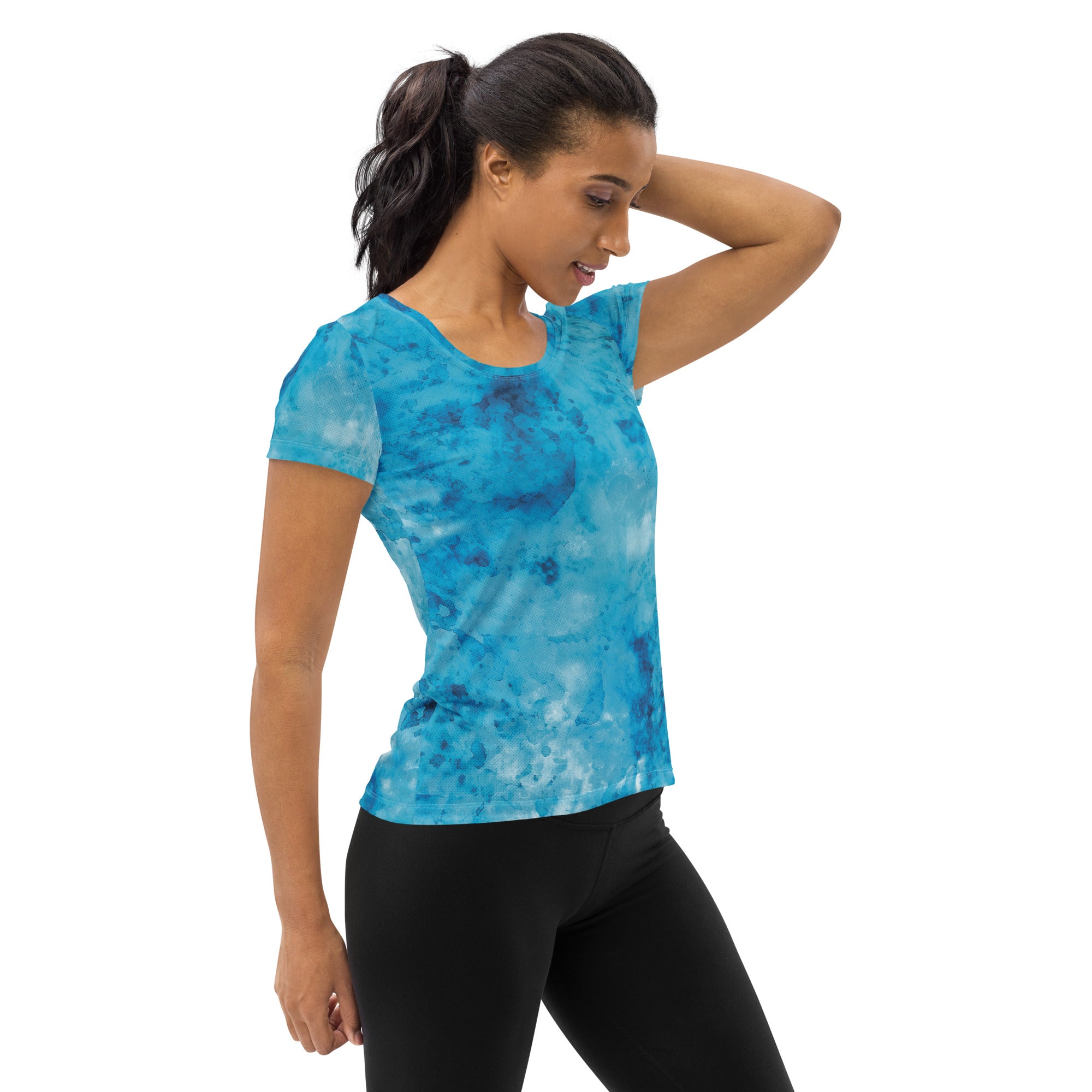 Women's Stretch Fit Athletic Sports T-shirt in blue marble print, showcasing its flexible fit and stylish design.