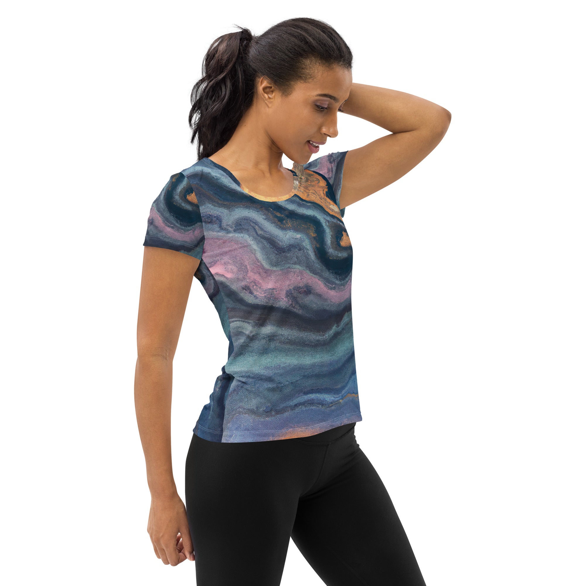 Women's Stretch Fit Athletic Sports T-shirt in blue pink marble swirl pattern, showcasing its soft fabric and athletic design.