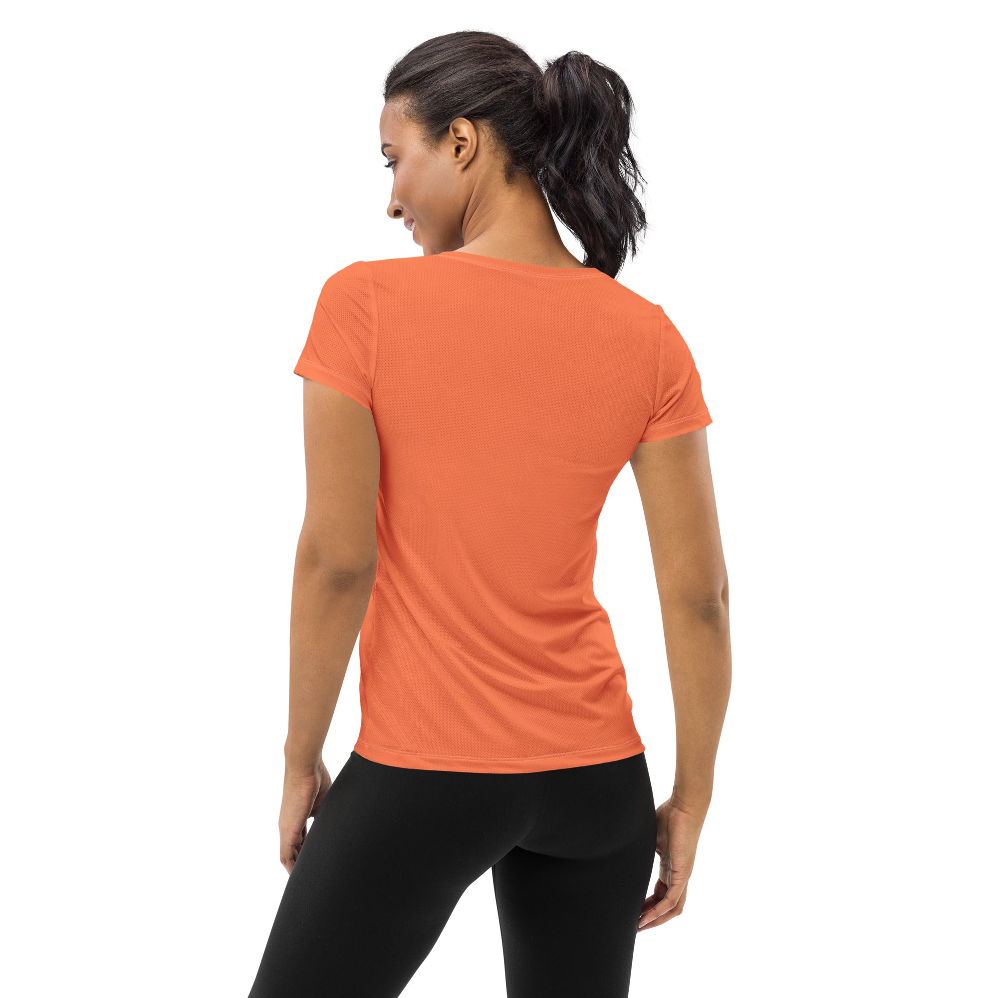 Women's Stretch Fit Athletic Sports T-shirt in Coral Orange Red, showcasing its flexible fit and stylish design.