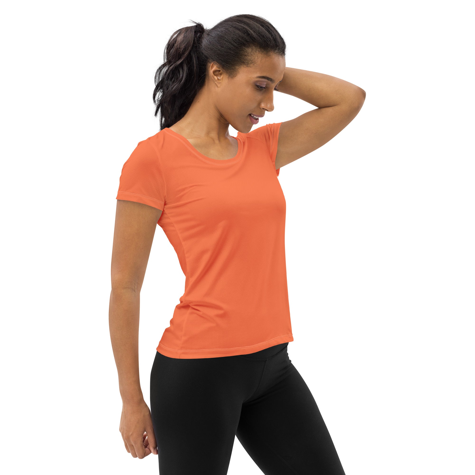 Women's Stretch Fit Athletic Sports T-shirt in Coral Orange Red, showcasing its flexible fit and stylish design.