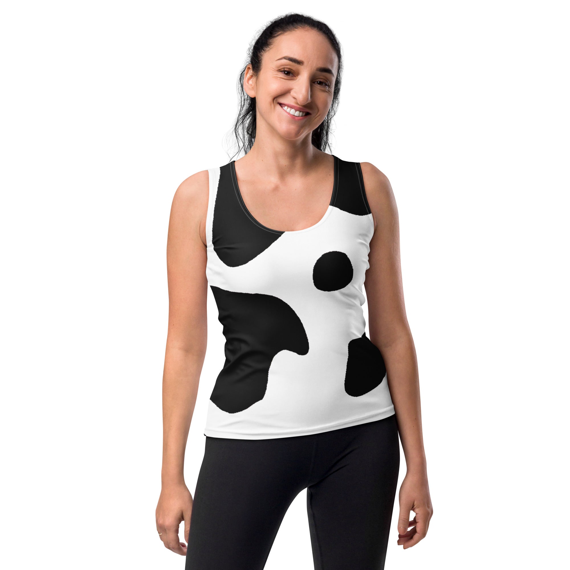 Women's Stretch Fit Tank Top in Black White Cow Print, showcasing a stylish sleeveless design and scoop neckline.