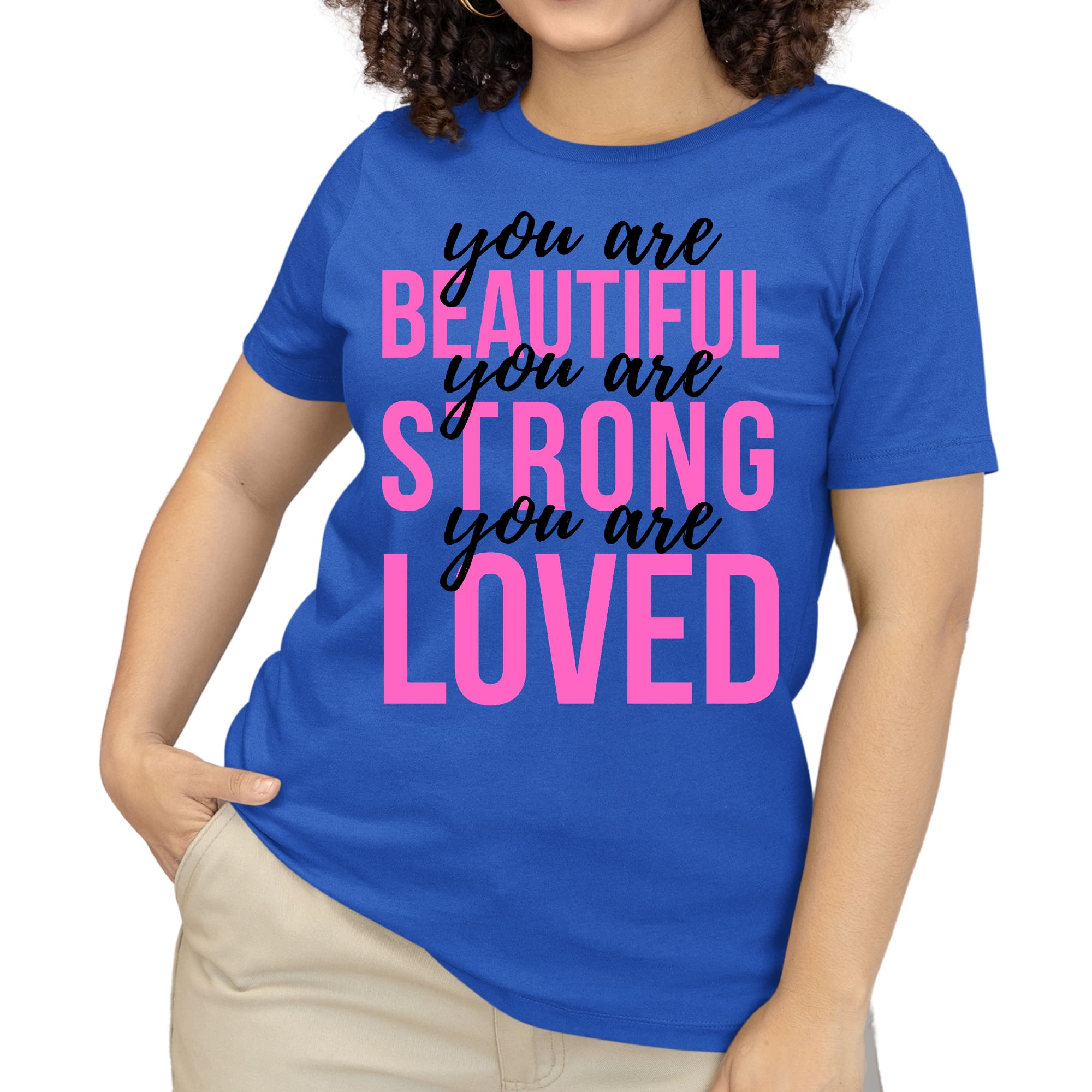 A pink women's T-shirt with the inspirational text 'You Are Beautiful Strong Loved' printed in black, showcasing a comfortable and stylish design.