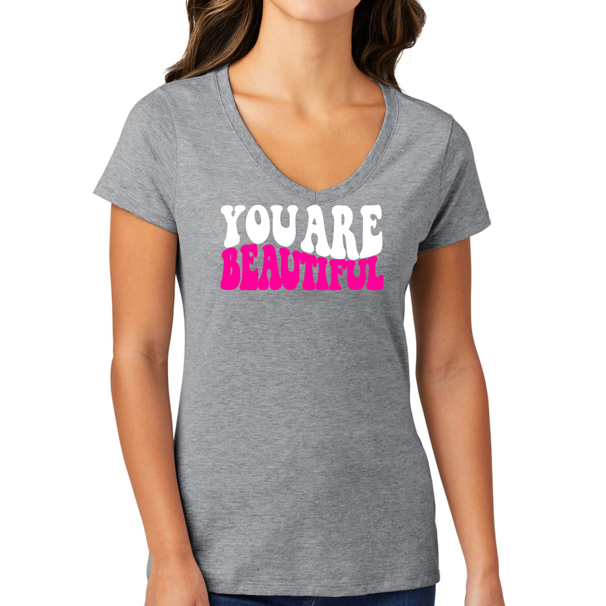 Women's V-neck Graphic T-shirt in pink and white with 'You Are Beautiful' inspirational design, made from soft preshrunk cotton.